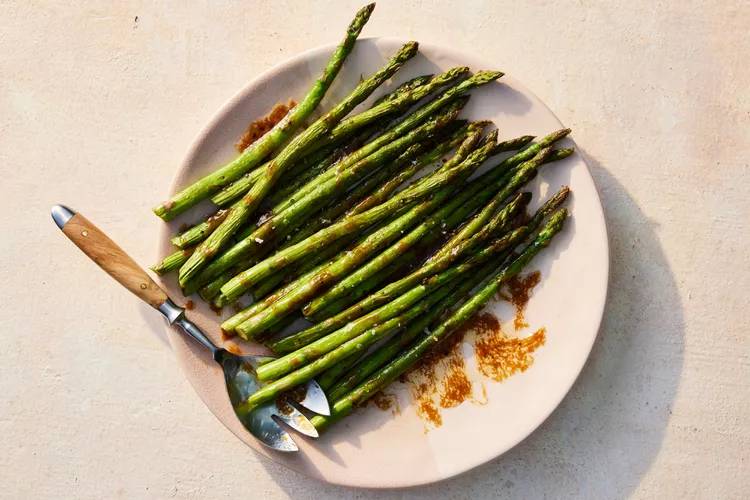 Roasted-Asparagus-with-Savory-Butter-Sauce-FT-RECIPE0124-d84558a8a9db4ce09d8542bae0b885f6.jpg